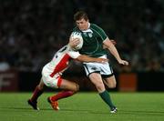 15 September 2007; Brian O'Driscoll, Ireland, is tackled by Irakli Giorgadze, Georgia. 2007 Rugby World Cup, Pool D, Ireland v Georgia, Stade Chaban Delmas, Bordeaux, France. Picture credit; Brendan Moran / SPORTSFILE