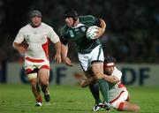 15 September 2007; Denis Leamy, Ireland, is tackled by Irakli Giorgadze, Georgia. 2007 Rugby World Cup, Pool D, Ireland v Georgia, Stade Chaban Delmas, Bordeaux, France. Picture credit; Brendan Moran / SPORTSFILE