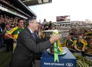 16 September 2007; The Ard Stiuirthoir of the GAA Liam Mulvihill lifts the Sam Maguire before presenting to to Kerry captain Declan O'Sullivan. Bank of Ireland All-Ireland Senior Football Championship Final, Kerry v Cork, Croke Park, Dublin. Picture credit; Ray McManus / SPORTSFILE