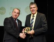 16 September 2007; Richie Connor, captain of the All-Ireland winning Offaly team of 1982, is presented with a medal to mark the 25th anniversary of the victory over Kerry by GAA President Nickey Brennan. GAA Jubilee Awards, Offaly 1982, Croke Park, Dublin. Picture credit: Ray McManus / SPORTSFILE