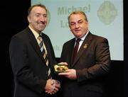 16 September 2007; Michael Lowry, a member of the All-Ireland winning Offaly team of 1982, is presented with a medal to mark the 25th anniversary of the victory over Kerry by GAA President Nickey Brennan. GAA Jubilee Awards, Offaly 1982, Croke Park, Dublin. Picture credit: Ray McManus / SPORTSFILE