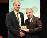 16 September 2007; Tomás Connor, a member of the All-Ireland winning Offaly team of 1982, is presented with a medal to mark the 25th anniversary of the victory over Kerry by GAA President Nickey Brennan. GAA Jubilee Awards, Offaly 1982, Croke Park, Dublin. Picture credit: Ray McManus / SPORTSFILE