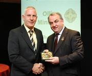 16 September 2007; Ollie Minnock, a member of the All-Ireland winning Offaly team of 1982, is presented with a medal to mark the 25th anniversary of the victory over Kerry by GAA President Nickey Brennan. GAA Jubilee Awards, Offaly 1982, Croke Park, Dublin. Picture credit: Ray McManus / SPORTSFILE