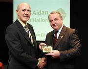 16 September 2007; Aidan O'Halloran, a member of the All-Ireland winning Offaly team of 1982, is presented with a medal to mark the 25th anniversary of the victory over Kerry by GAA President Nickey Brennan. GAA Jubilee Awards, Offaly 1982, Croke Park, Dublin. Picture credit: Ray McManus / SPORTSFILE