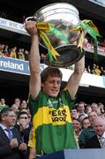 16 September 2007; Kerry substitute Donncha Walsh lifts the Sam Maguire Cup. Bank of Ireland All-Ireland Senior Football Championship Final, Kerry v Cork, Croke Park, Dublin. Picture credit; Ray McManus / SPORTSFILE