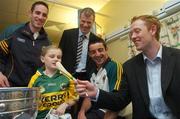 17 September 2007; Kerry senior footballer Colm Cooper holding a miniature hurley with team-mates, from left, Declan O'Sullivan, Diarmuid Murphy, Aidan O'Mahony, and nine year old Chloe Scollard along with the Sam Maguire Cup on a visit to Our Lady's Hospital for Sick Children. Crumlin, Dublin. Picture credit; Pat Murphy / SPORTSFILE