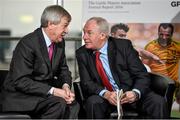 14 January 2015; The Gaelic Players Association's Annual Report for 2014 was launched today at the offices of PwC by Michael Ring, T.D., Minister of State for Sport and Tourism. In attendance at the launch were Ard Stiúrthóir of the GAA Páraic Duffy, left, and Michael Ring, T.D., Minister of State for Sport and Tourism. Launch of the GPA’s Annual Report 2014. PwC, One Spencer Dock, North Wall Quay, Dublin. Picture credit: Barry Cregg / SPORTSFILE