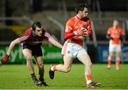 14 January 2015; Oisin MacIomhair, Armagh, in action against Dermot Morrow, St Mary's University College. Bank of Ireland Dr McKenna Cup, Group B, Round 3, Armagh v St Mary's University College. Athletic Grounds, Armagh. Picture credit: Oliver McVeigh / SPORTSFILE