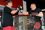 15 January 2015; Dennis Siver, right, during an open workout session ahead of his fight against Conor McGregor in TD Garden, Boston, on Sunday. UFC Fight Night Open Workouts, UFC Gym, Boston, Massachusetts, USA. Picture credit: Ramsey Cardy / SPORTSFILE