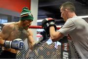 15 January 2015; Conor McGregor, left, during an open workout session ahead of his fight against Dennis Siver in TD Garden, Boston, on Sunday. UFC Fight Night Open Workouts, UFC Gym, Boston, Massachusetts, USA. Picture credit: Ramsey Cardy / SPORTSFILE