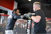 15 January 2015; Benson Henderson, left, during an open workout session ahead of his fight against Donald Cerrone in TD Garden, Boston, on Sunday. UFC Fight Night Open Workouts, UFC Gym, Boston, Massachusetts, USA. Picture credit: Ramsey Cardy / SPORTSFILE
