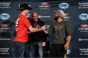 16 January 2015; Donald 'Cowboy' Cerrone, left, shakes hands with Benson Henderson ahead of their fight in TD Garden, Boston, on Sunday. UFC Fight Night Ultimate Media Day, Ned Devine’s Irish Pub, Boston, Massachusetts, USA. Picture credit: Ramsey Cardy / SPORTSFILE