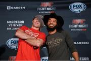 16 January 2015; Donald 'Cowboy' Cerrone, left, after swapping hats with Benson Henderson ahead of their fight in TD Garden, Boston, on Sunday. UFC Fight Night Ultimate Media Day, Ned Devine’s Irish Pub, Boston, Massachusetts, USA. Picture credit: Ramsey Cardy / SPORTSFILE