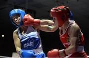 16 January 2015; Dervla, Duffy, right, St. Brigids Boxing Club, Co. Kildare, exchanges punches with Carly McNaul, Holy Trinity boxing club, Belfast, during their 57kg bout. National Elite Boxing Championships, Semi-Finals, National Stadium, Dublin. Picture credit: David Maher / SPORTSFILE