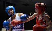 16 January 2015; Dervla, Duffy, right, St. Brigids Boxing Club, Co. Kildare, exchanges punches with Carly McNaul, Holy Trinity Boxing Club, Belfast, during their 57kg bout. National Elite Boxing Championships, Semi-Finals, National Stadium, Dublin. Picture credit: David Maher / SPORTSFILE