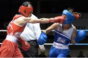 16 January 2015; Dervla Duffy, St. Brigids/Defence, left exchanges punches with Carly McNaul, Holy Trinity Boxing Club, during their 57kg bout. National Elite Boxing Championships, Semi-Finals, National Stadium, Dublin. Picture credit: Cody Glenn / SPORTSFILE