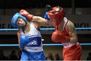 16 January 2015; Dervla Duffy, right, St. Brigids Boxing Club, Co. Kildare/Defence, exchanges punches with Carly McNaul, Holy Trinity Boxing Club, Belfast, during their 57kg bout. National Elite Boxing Championships, Semi-Finals, National Stadium, Dublin. Picture credit: Cody Glenn / SPORTSFILE