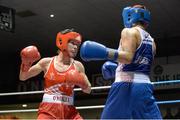 16 January 2015; Dervla Duffy, left, St. Brigids Boxing Club, Co. Kildare/Defence, exchanges punches with Carly McNaul, Holy Trinity Boxing Club, Belfast, during their 57kg bout. National Elite Boxing Championships, Semi-Finals, National Stadium, Dublin. Picture credit: Cody Glenn / SPORTSFILE