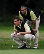 15 September 2007; Gary McDermott and his caddy David McDermott, Co. Sligo Golf Club, line up a putt on the 11th green during the Bulmers Senior Cup Final. Bulmers Cups and Shields Finals 2007, Shandon Park Golf Club, Belfast, Co. Antrim. Picture credit: Ray McManus / SPORTSFILE