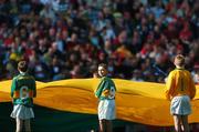 16 September 2007; A young flag bearer takes in the atmosphere before the start of the match. Bank of Ireland All-Ireland Senior Football Championship Final, Kerry v Cork, Croke Park, Dublin. Picture credit; Brian Lawless / SPORTSFILE