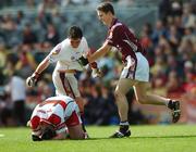 16 September 2007; Galway players Colin Forde, right, and Owen Higgins, celebrate at the final whistle as Derry's Gavin McGeehan falls to his knees. ESB All-Ireland Minior Football Championship Final, Galway v Derry, Croke Park, Dublin. Picture credit; Brian Lawless / SPORTSFILE