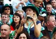 2 September 2007; A Limerick fan watches the game. Guinness All-Ireland Senior Hurling Championship Final, Kilkenny v Limerick, Croke Park, Dublin. Picture Credit; Ray McManus / SPORTSFILE
