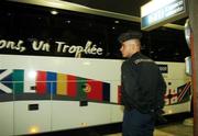 19 September 2007; A local policeman watches as the Ireland squad's team bus pulls away after their arrival by TGV at Gare Montparnasse ahead of their Pool D match with France on Friday night next. 2007 Rugby World Cup, Paris, France. Picture credit: Brendan Moran / SPORTSFILE