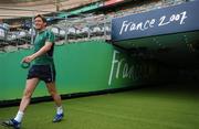 20 September 2007; A smiling Ronan O'Gara makes his way onto the pitch before practices his kicking during the Ireland squad captain's run ahead of their Pool D game with France. Ireland Rugby Captain's Run, 2007 Rugby World Cup, Pool D, Stade De France, Saint Denis, Paris, France. Picture credit: Brendan Moran / SPORTSFILE *** Local Caption ***