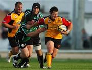 21 September 2007; Rhodri Gomer Davis, Dragons, is tackled by Brett Wilkinson, Connacht. Magners League, Connacht v Dragons. Sportsground, Galway. Picture credit; David Maher / SPORTSFILE