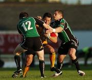 21 September 2007; Rhodri Gomer Davies, Dragons, is tackled by Aidan Wynne, 12, and Mel Deane, Connacht. Magners League, Connacht v Dragons. Sportsground, Galway. Picture credit; David Maher / SPORTSFILE