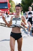 22 September 2007; Pauline Curley, Tullamore Harriers A.C., crosses the line to win the adidas Dublin Half Marathon. Phoenix Park, Dublin. Picture credit; Tomas Greally / SPORTSFILE