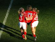 23 September 2007; Cork players Angela Walsh, left, and Amy O'Shea carry their injured team-mate Mary O'Connor during the celebrations. TG4 All-Ireland Ladies Senior Football Championship Final, Cork v Mayo, Croke Park, Dublin. Picture credit; David Maher / SPORTSFILE