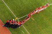 23 September 2007; The  Cork players and officials stand together during the National Anthem. TG4 All-Ireland Ladies Senior Football Championship Final, Cork v Mayo, Croke Park, Dublin. Picture credit; David Maher / SPORTSFILE