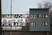 17 January 2015; A general view of the scoreboard during the final moments of the game as scoreboard operator Dean Fogarty, from Kilmallock, looks on. Waterford Crystal Cup Quarter-Final, Limerick v Waterford. John Fitzgerald Park, Kilmallock, Co. Limerick. Picture credit: Diarmuid Greene / SPORTSFILE