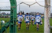17 January 2015; Waterford players, from left to right, Martin O'Neill, Austin Gleeson, Kevin Moran and Shane Bennett leave the pitch after defeat to Limerick. Waterford Crystal Cup Quarter-Final, Limerick v Waterford. John Fitzgerald Park, Kilmallock, Co. Limerick. Picture credit: Diarmuid Greene / SPORTSFILE