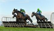 17 January 2015; A Grey Matter, centre, with Mark Walsh up, jumps the last ahead of Westerners Son, right, with Conor Maxwell up, and Frontline, left, with Davy Russell up, on their way to winning the Follow Naas On Facebook Handicap Hurdle. Naas, Co. Kildare. Picture credit: Barry Cregg / SPORTSFILE
