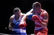 17 January 2015; Dean Gardiner, Clonmel, Co. Tipperary, right, exchanging punches with Niall Kennedy, Gorey, Co. Wexford, during their 91+Kg bout. National Elite Boxing Championships, Semi-Finals. National Stadium, Dublin. Picture credit: Pat Murphy / SPORTSFILE