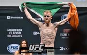 17 January 2015; Paddy Holohan weighs in ahead of his fight against Shane Howell in TD Garden, Boston, on Sunday. UFC Fight Night Weigh-in, Orpheum Theatre, Boston, Massachusetts, USA. Picture credit: Ramsey Cardy / SPORTSFILE