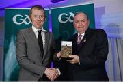 17 January 2015; Uachtarán Chumann Lúthchleas Gael Liam Ó Néill presents Donall Farmer, Inpho Photography, with the Professional Photgraphic Award. GAA MacNamee Awards 2014, Croke Park, Dublin. Picture credit: Barry Cregg / SPORTSFILE