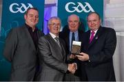 17 January 2015; Uachtarán Chumann Lúthchleas Gael Liam Ó Néill presents Peter Campbell, second from left, with the Provincial Media Award, with Alan Foley, left, and Tom Comack all from the Donegal Democrat at the awards. GAA MacNamee Awards 2014, Croke Park, Dublin. Picture credit: Barry Cregg / SPORTSFILE