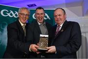 17 January 2015; Uachtarán Chumann Lúthchleas Gael Liam Ó Néill presents Aidan O'Connor, left, and Rory Kirby, Austin Stacks GAA Club, with the Club Project Award. GAA MacNamee Awards 2014, Croke Park, Dublin. Picture credit: Barry Cregg / SPORTSFILE