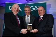 17 January 2015; Uachtarán Chumann Lúthchleas Gael Liam Ó Néill presents Jarlath Cloonan, left, and Mick Curley, centre, with the Programme Award for Galway County Hurling Final Programme. GAA MacNamee Awards 2014, Croke Park, Dublin. Picture credit: Barry Cregg / SPORTSFILE
