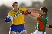 18 January 2015; Mark Nally, Roscommon, in action against Chris Barrett, Mayo. FBD League, Section A, Round 3, Mayo v Roscommon, Elverys MacHale Park, Castlebar, Co. Mayo. Picture credit: David Maher / SPORTSFILE