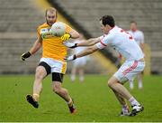 18 January 2015; Sean McVeigh, Antrim, in action against Justin McMahon, Tyrone. Bank of Ireland Dr McKenna Cup, Group C, Round 3, Tyrone v Antrim, St. Tiernach's Park, Clones, Co. Tyrone. Picture credit: Oliver McVeigh / SPORTSFILE
