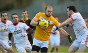 18 January 2015; Sean McVeigh, Antrim, in action against Barry Tierney, Tyrone. Bank of Ireland Dr McKenna Cup, Group C, Round 3, Tyrone v Antrim, St. Tiernach's Park, Clones, Co. Tyrone. Picture credit: Oliver McVeigh / SPORTSFILE