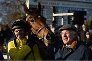 18 January 2015; Jockey Adrian Heskin with Foxrock and trainer Ted Walsh after winning the BoyleSports Handicap Steeplechase. Leopardstown, Co. Dublin. Picture credit: Barry Cregg / SPORTSFILE