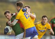 18 January 2015; Diarmuid O'Connor, Mayo, in action against Ronan Daly, Roscommon. FBD League, Section A, Round 3, Mayo v Roscommon, Elverys MacHale Park, Castlebar, Co. Mayo. Picture credit: David Maher / SPORTSFILE