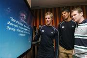 19 September 2007; Ireland players Andrew Trimble, left, Donncha O'Callaghan and Gordon D'Arcy reading messages of support for the team sent to their Team Room in France by supporters through the O2 website. 2007 Rugby World Cup, Sofitel Bordeaux Aquitania, Bordeaux, France. Picture credit: Brendan Moran / SPORTSFILE