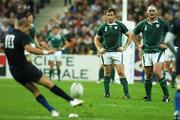 21 September 2007; Ireland players Marcus Horan, left, and John Hayes watch as Frederic Michalak, France, kicks a penalty. 2007 Rugby World Cup, Pool D, Ireland v France, The Stade de France, Saint Denis, Paris, France. Picture credit; Brendan Moran / SPORTSFILE