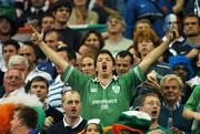 21 September 2007; An Irish fan sings Ireland's Call before the start of the game. 2007 Rugby World Cup, Pool D, Ireland v France, The Stade de France, Saint Denis, Paris, France. Picture credit; Matt Browne / SPORTSFILE
